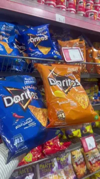 رقائق ذرة دوريتوس - جبن الناتشو والفلفل الحلو (Doritos)