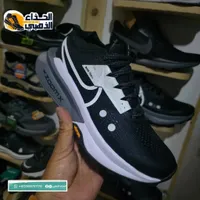 حذاء رياضي سوكوني - أسود وأبيض
