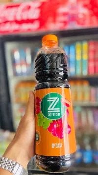 مشروب غازي بنكهة العنب - تابوزينا (Tapuzina)