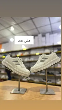 حذاء رياضي شبابي أبيض - مش عند