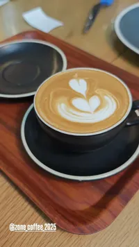 قهوة لاتيه بفن آرت